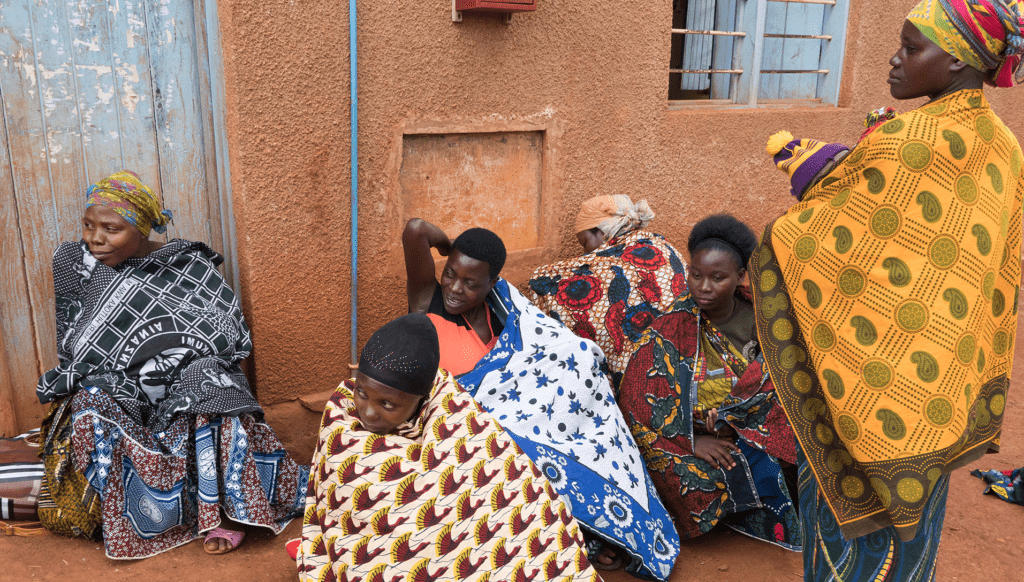 Women wait for consultation at a health center in Buhigwe, Tanzania. Photo by Magali Rochat/VectorWorks, courtesy of Photoshare.