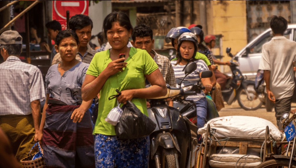 A crowded market in Burma. Photo by Yoshitaka Ando, courtesy of Flickr Creative Commons. 