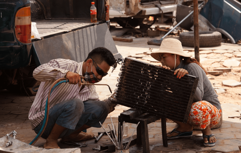 Workers in Cambodia. Photo by Roger Gerbig, courtesy of Flickr Creative Commons. 
