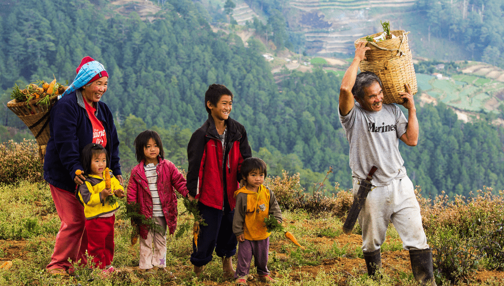 A family carries harvested vegetables in the Philippines. Photo by Maria Francesca Avila, courtesy of Photoshare.