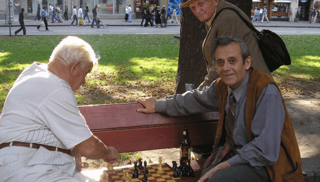 Older men play chess in Ukraine. Photo by Iryna Shabaykovych, courtesy of Photoshare.